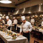 Restauration : pourquoi près d’un recrutement sur deux reste difficile Équipe de restaurant au travail pendant le service, cuisine et salle animées