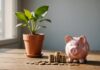 Livret A à 1,7 % : ce qui change pour votre épargne au 1er août 2026 Tirelire et pièces en euros illustrant la hausse du taux du Livret A en août 2026